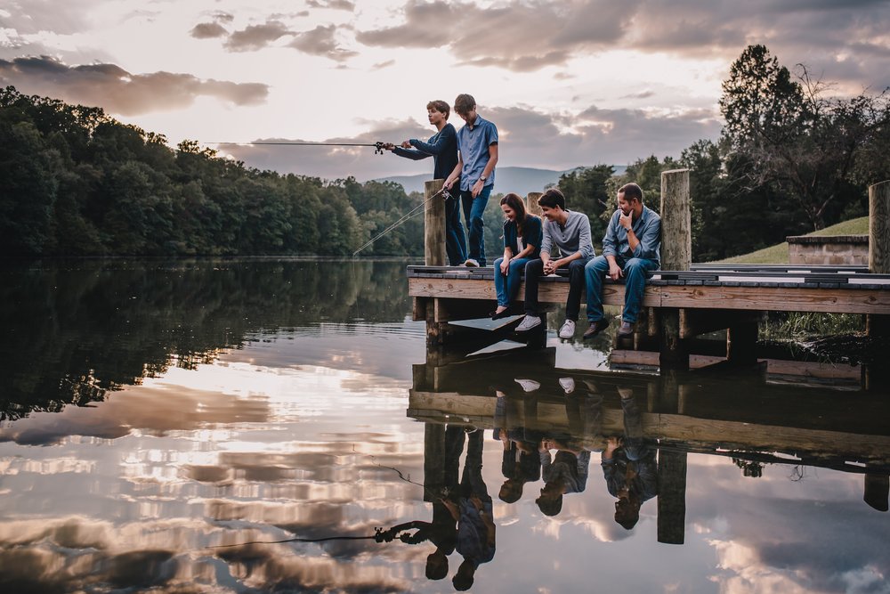 family photos with teens fishing on dock