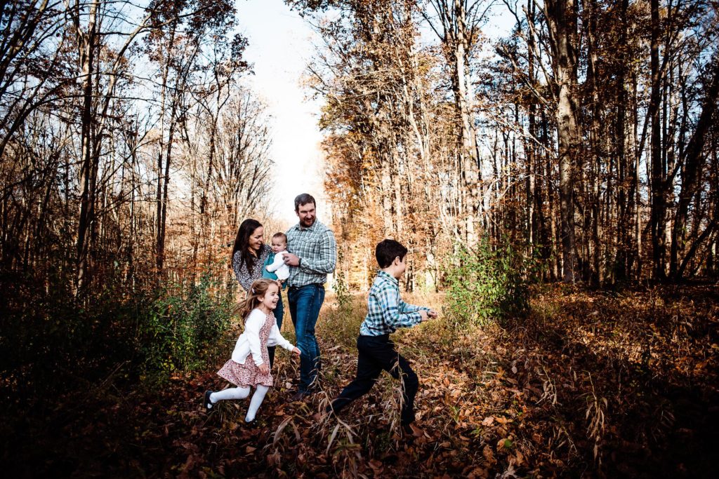 fall family photos in charlottesville with fall leaves