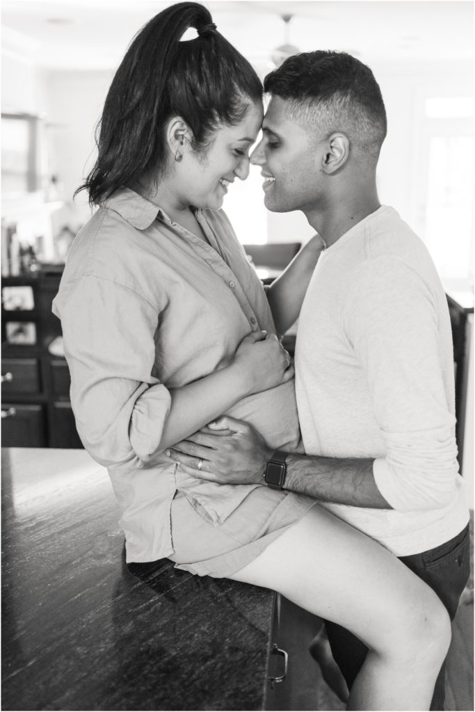 maternity photos at home, poses in kitchen