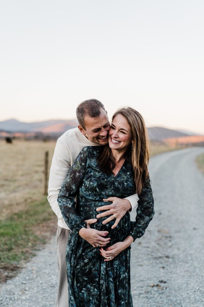 winter maternity photos with couple outdoors in charlottesville, va