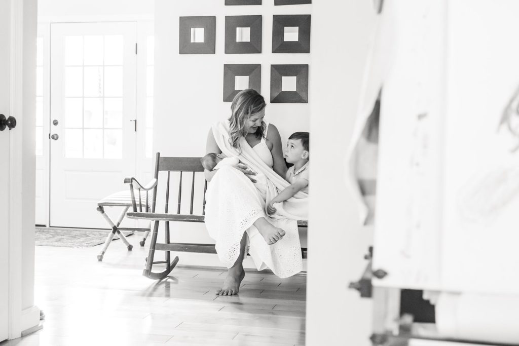newborn photo ideas at home with sibling by charlottesville photographer