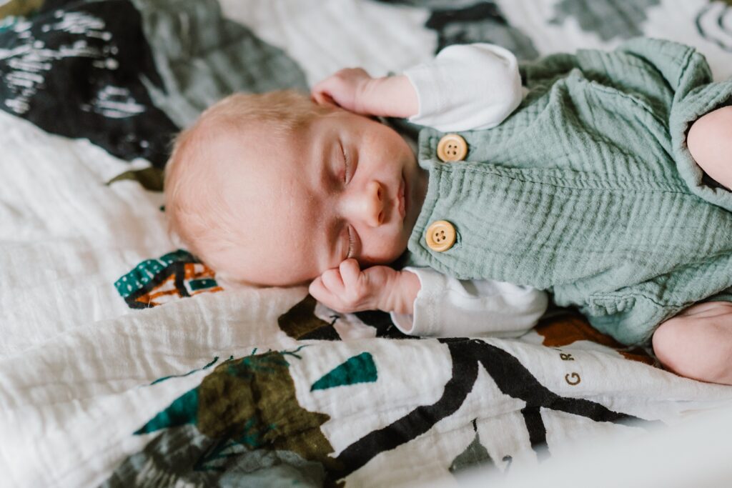 baby boy in crib, lifestyle newborn photos